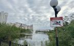 Фоторепортаж: как сегодня выглядит Теплое озеро, благоустройство которого отложили
