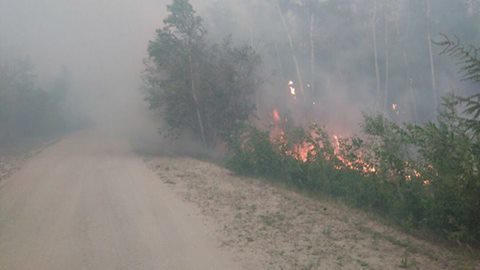 Огонь отступил от села Модут в Якутии
