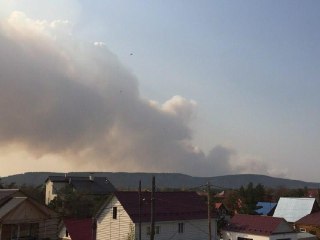 Близ Якутска продолжают тушить лесной пожар в районе 15 км Вилюйского тракта