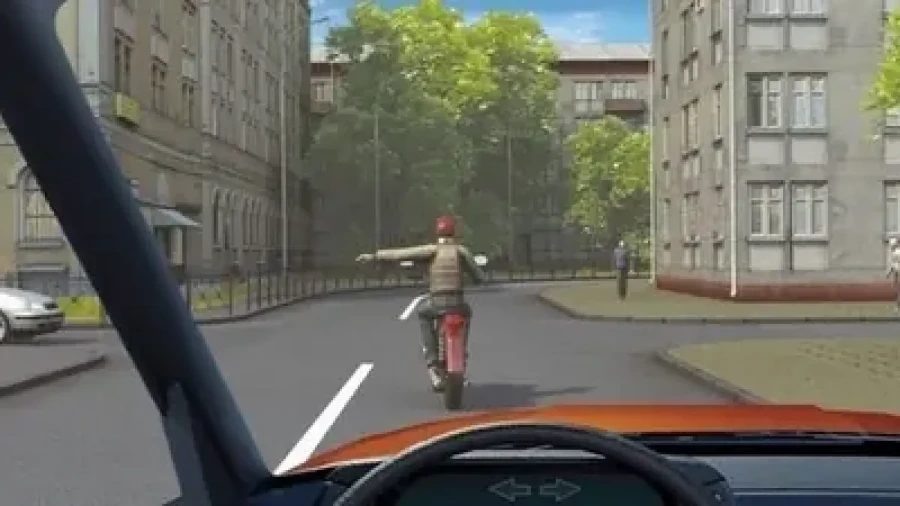 Жест мотоциклиста из билета ПДД: ошибаются 92% — а вы точно знаете, что он показывает?